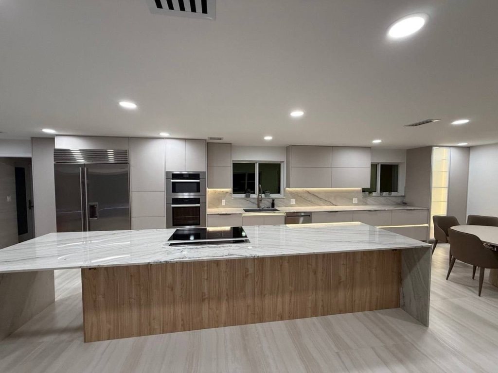 Handleless kitchen with a wood-front island