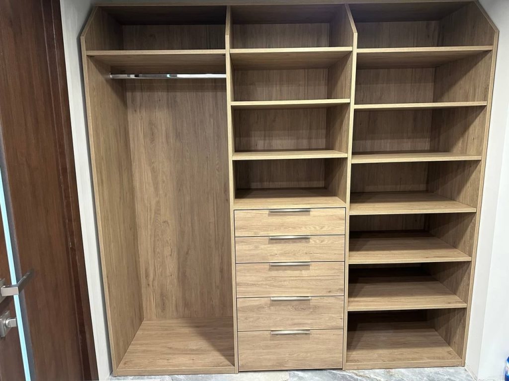 Oak closet system with hanging space and drawers
