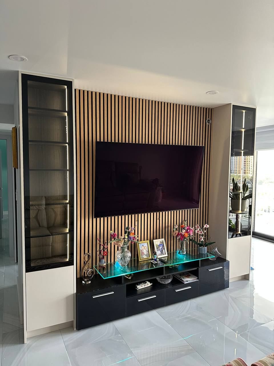 Media wall with glass display cabinets