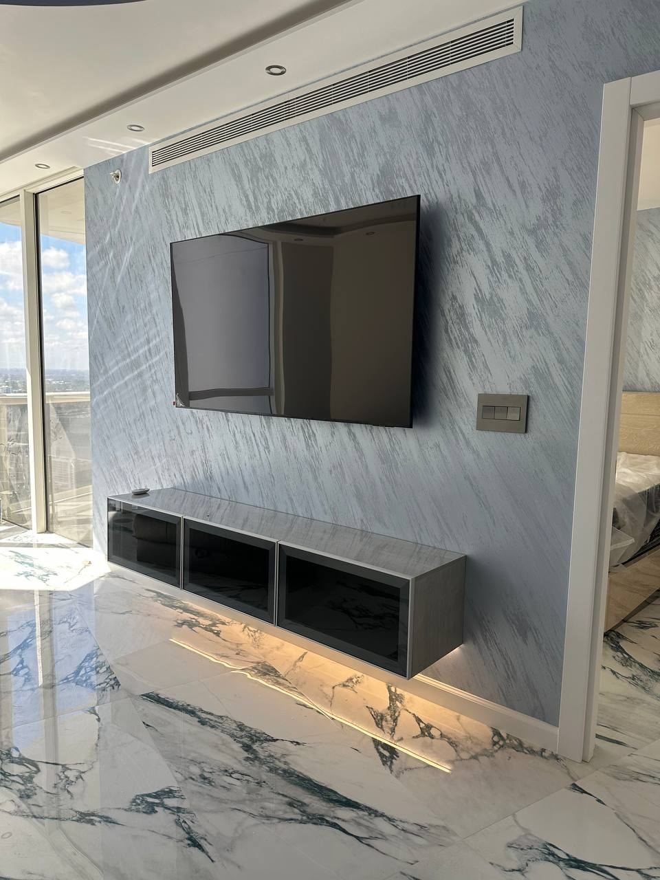 Floating TV console with LED lighting