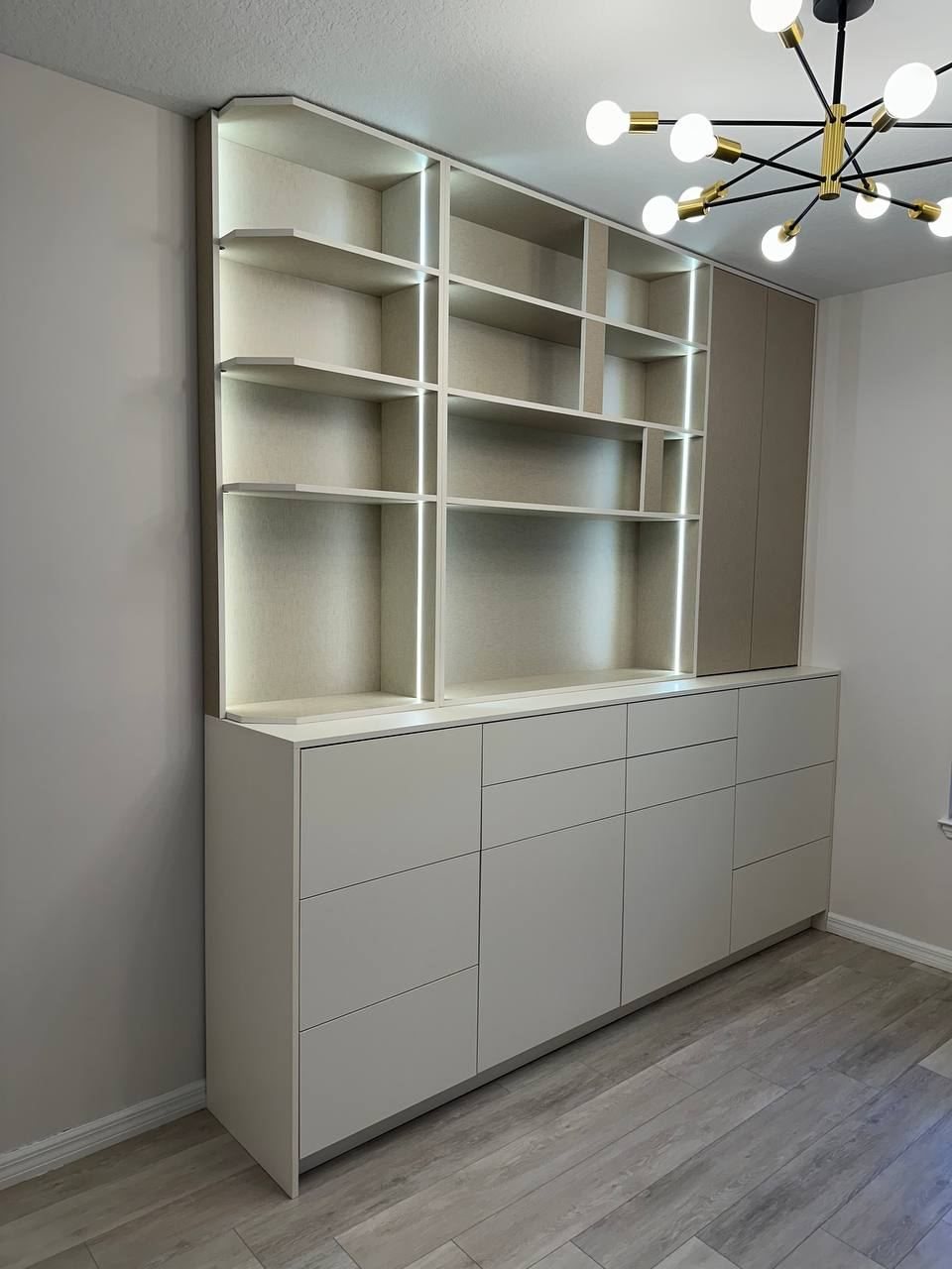 Built-in shelving unit with lower cabinets